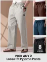 Mens pyjama pants - with fit available as loose-fit in different colors with text "Pick any 2" and "6 colors available" 
