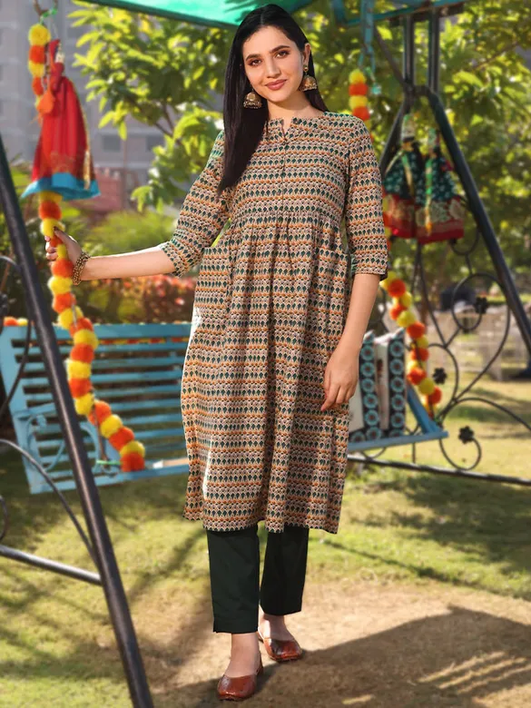 Tribal Printed Beige Flare Kurti With Bottle Green Pant,