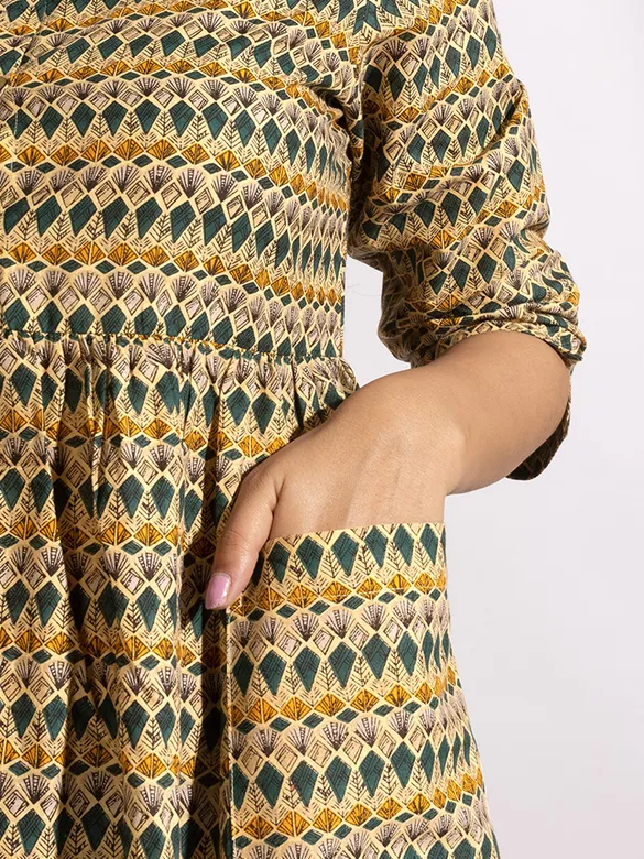 Tribal Printed Beige Flare Kurti With Bottle Green Pant