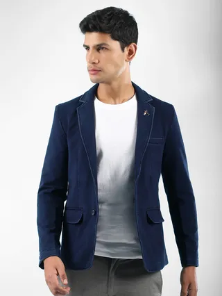 men in navy blue blazer jackets online , white t-shirt, and grey trousers