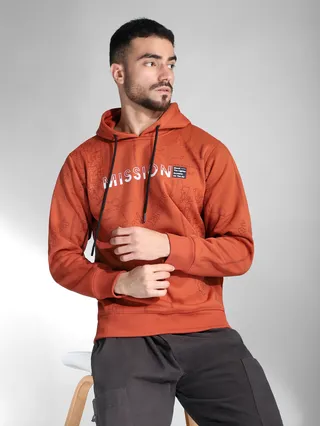 Mens orange hoodie with " Mission " Text and Graphic Design.