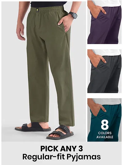 Mens pyjama pants with regular fit in different colors with text "Pick any 3" and "8 colors available."